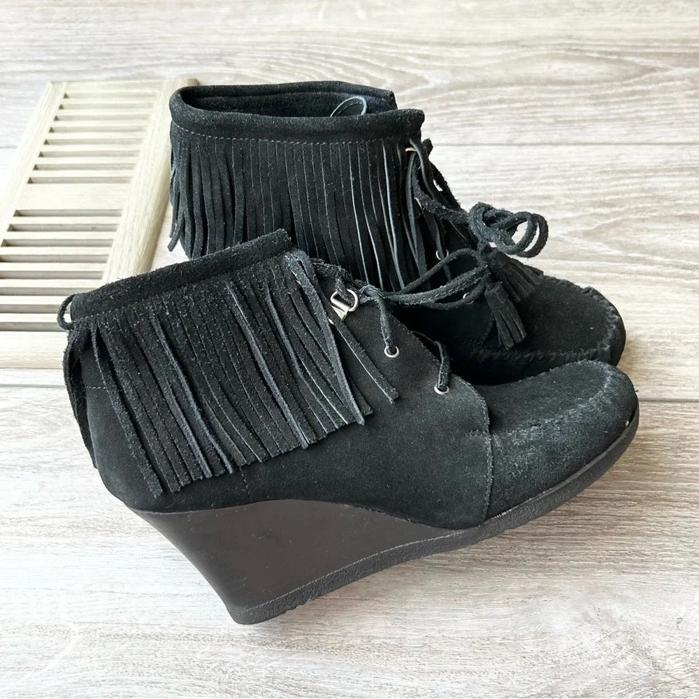 Minnetonka Black Lace-Up Fringe Wedge Booties
